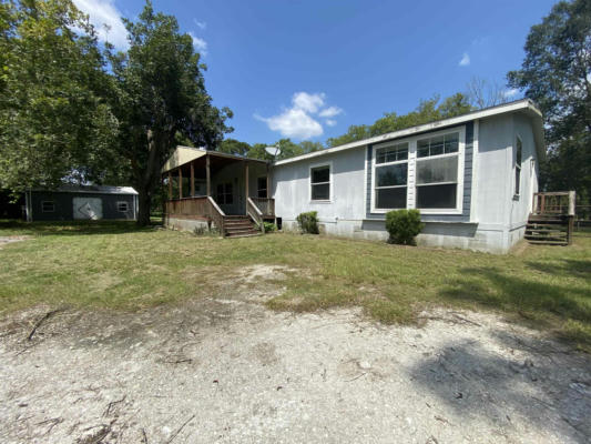 845 S GUSTAN ST, SOUR LAKE, TX 77659 - Image 1